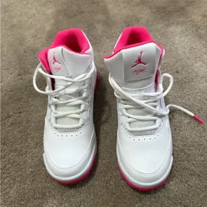 Kids Jordan White and Pink Sneakers