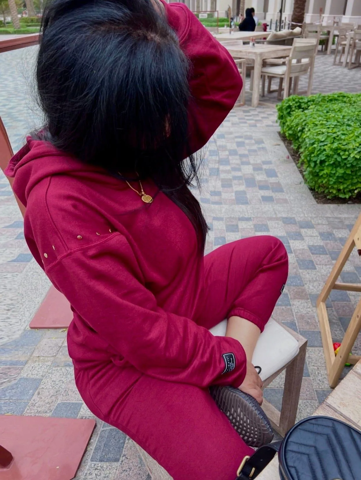 Oversized maroon hoodie with shoulder EYELETS