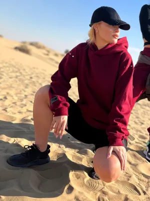 Oversized maroon hoodie with shoulder EYELETS